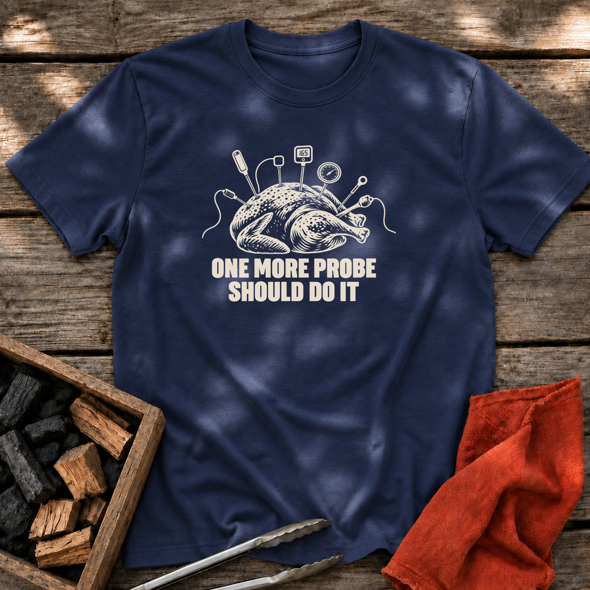 Navy T-shirt with the design “ONE MORE PROBE SHOULD DO IT” printed on the front.