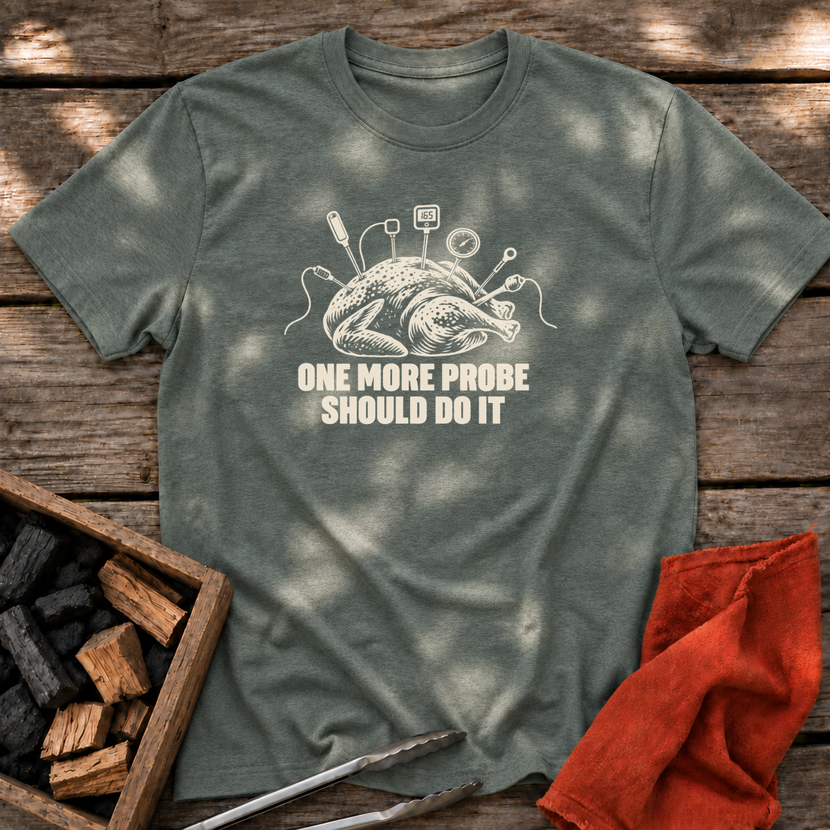 Heather Military Green T-shirt with the design “ONE MORE PROBE SHOULD DO IT” printed on the front.
