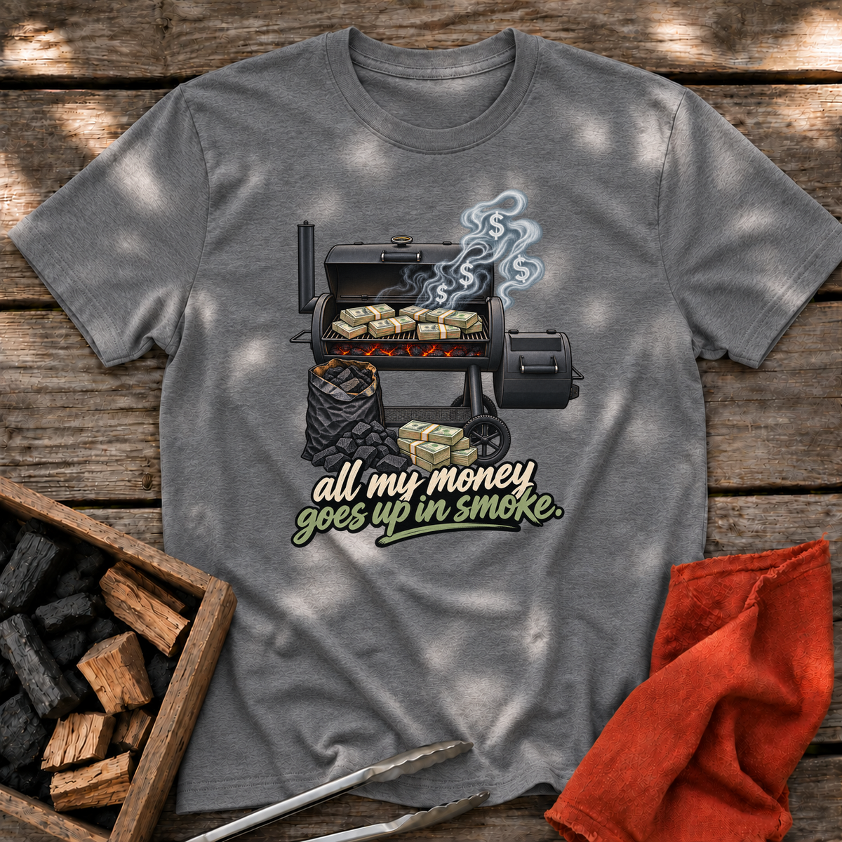 Graphite Heather T-shirt with the design “all my money goes up in smoke.” printed on the front.