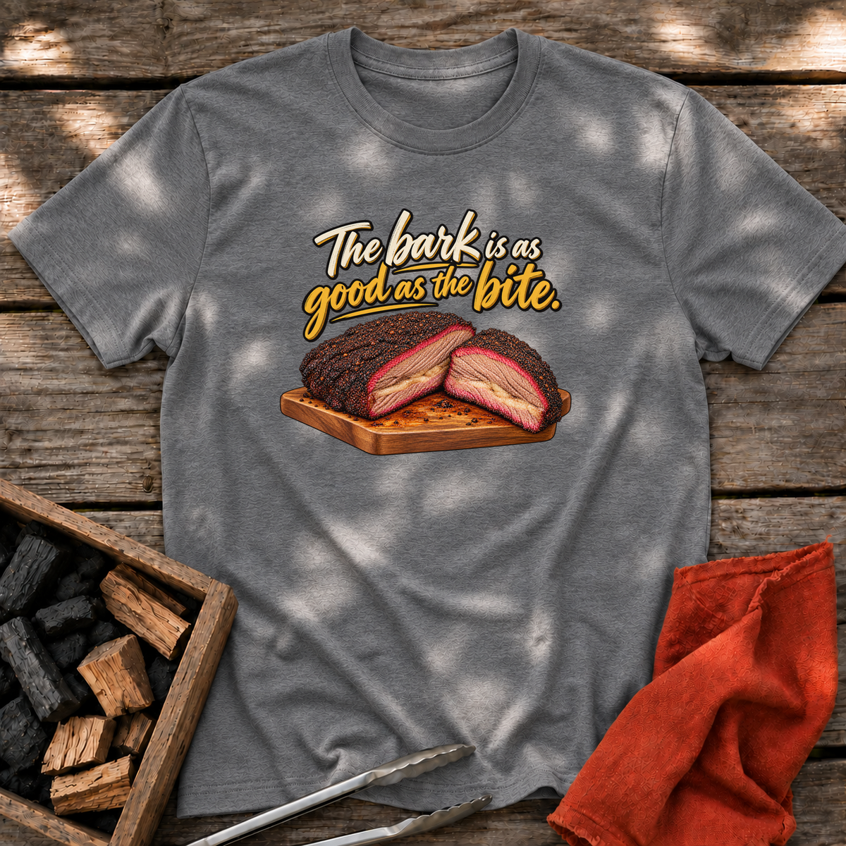 Graphite Heather T-shirt with the design “The bark is as good as the bite.” printed on the front.