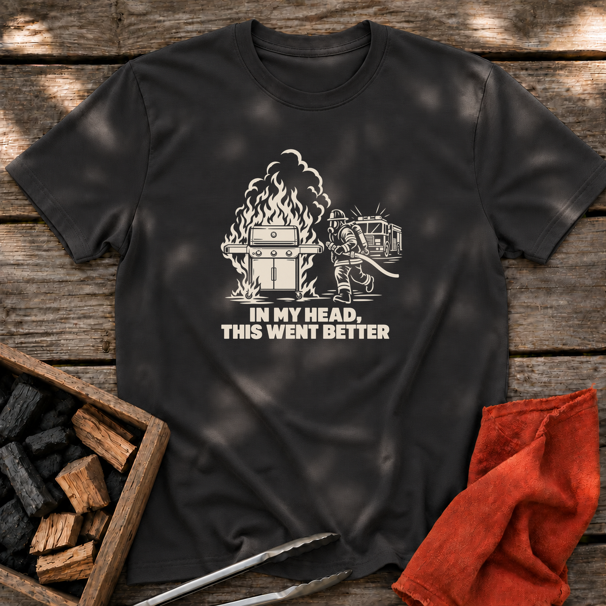 Black T-shirt with the design “IN MY HEAD, THIS WENT BETTER” printed on the front.