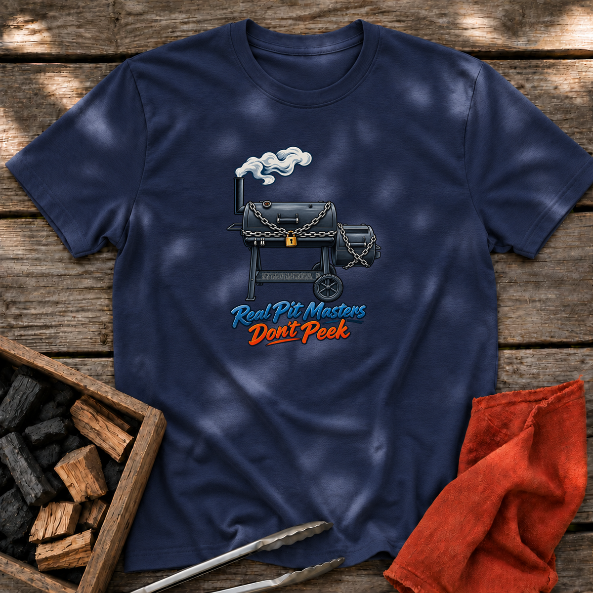 Navy T-shirt with the design “Real Pit Masters Don't Peek” printed on the front.